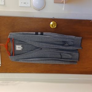 Grey cardigan with black stripes on sleeve